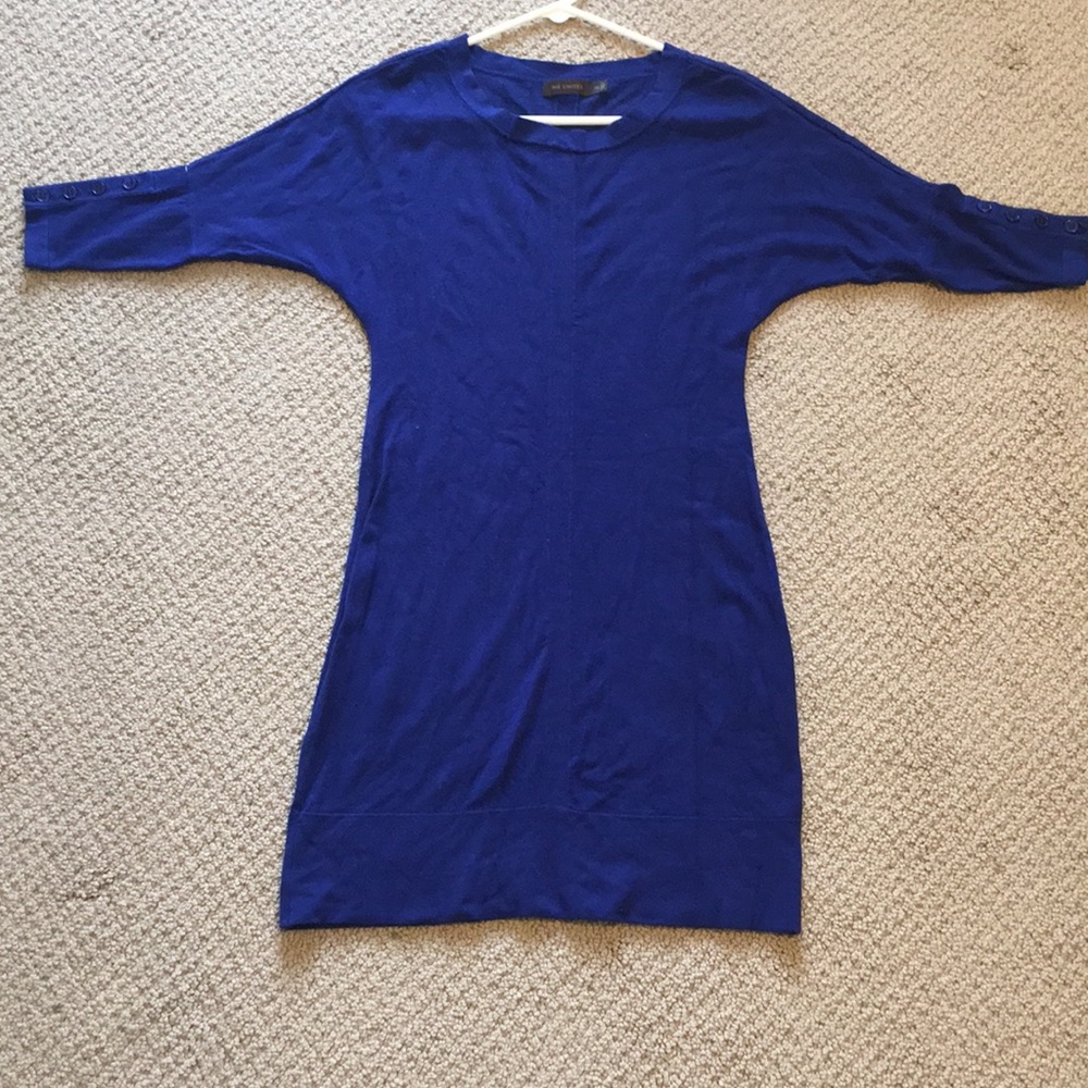 The limited royal blue dress with button sleeves